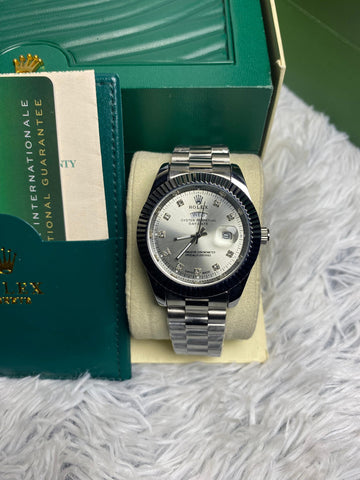 Rolex Silver Day And Date In White Dial